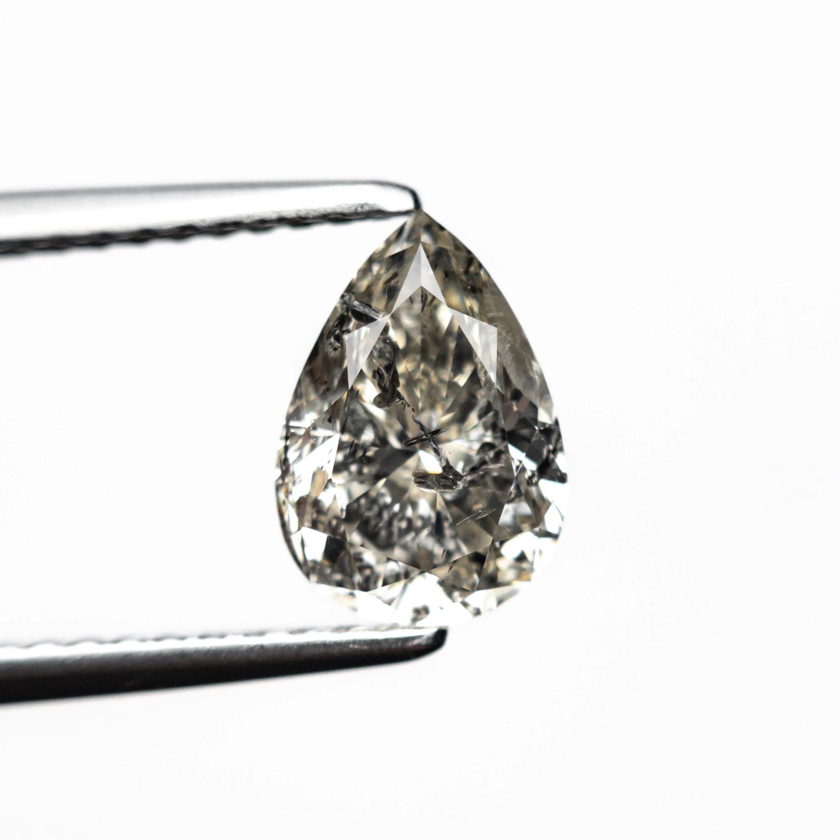 1.29 CARAT SALT AND PEPPER BRILLIANT CUT PEAR DIAMOND