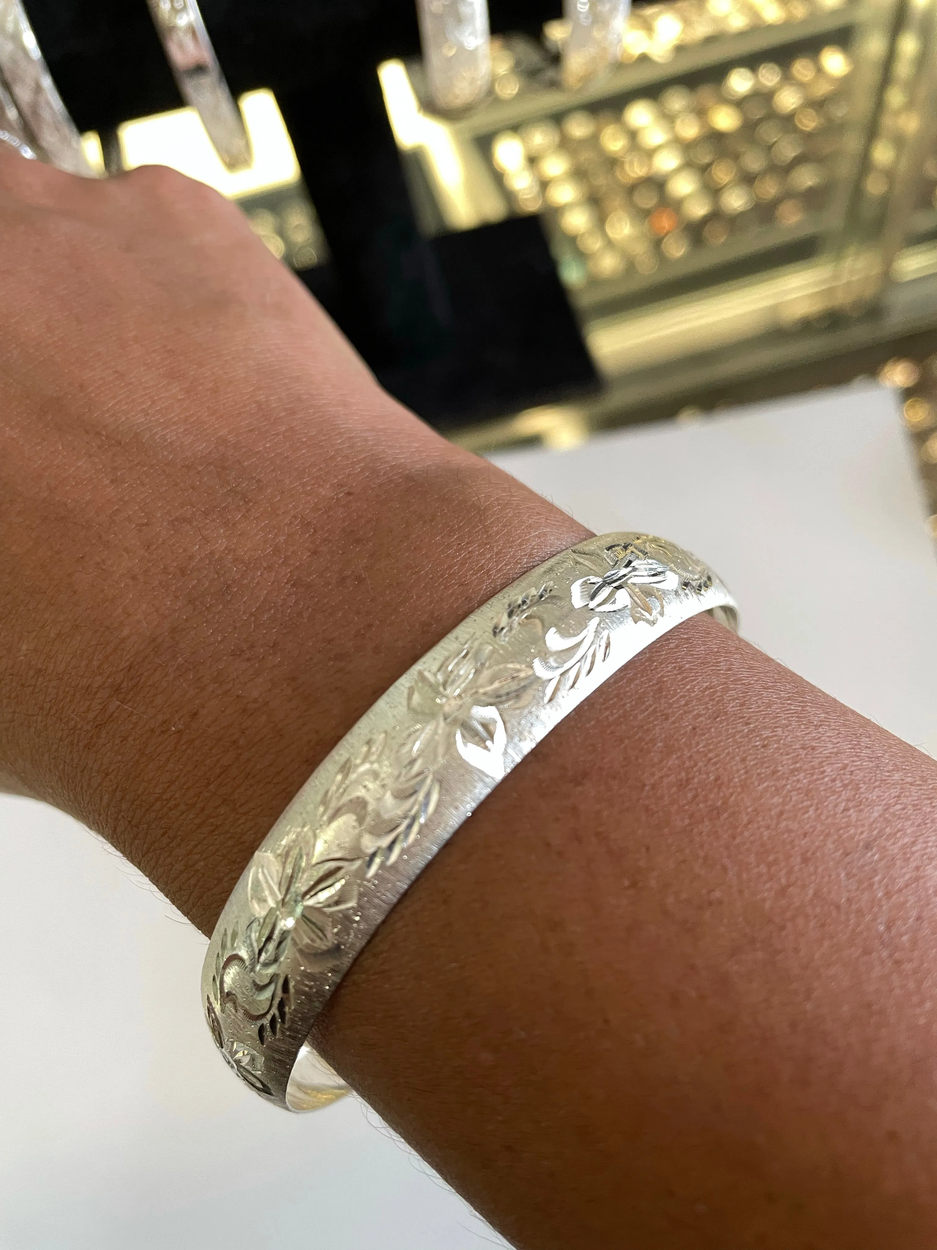 Esmeralda's Bangle Bracelet with Engraved Floral Design