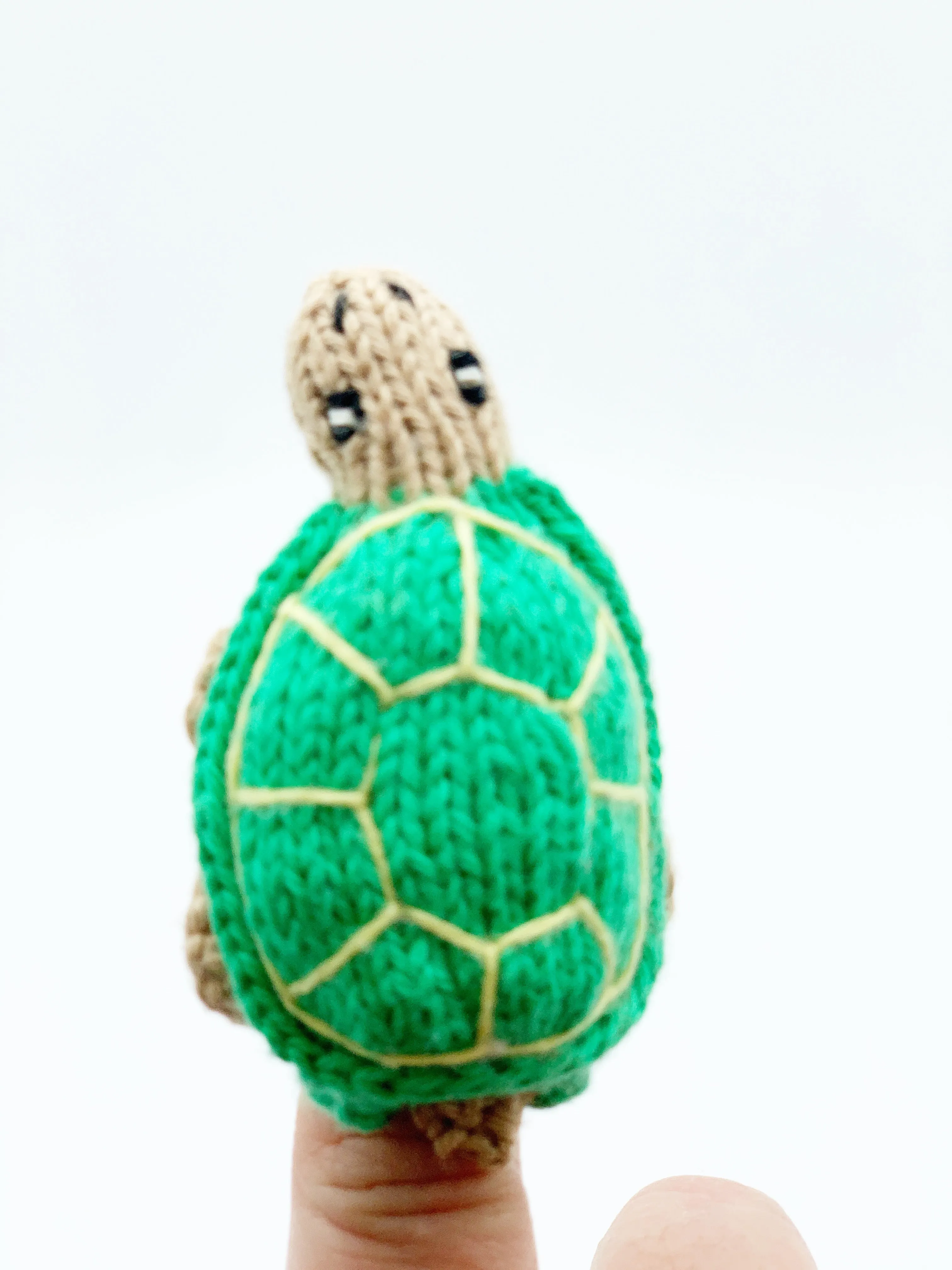 Finger puppets of animals and creatures found at home