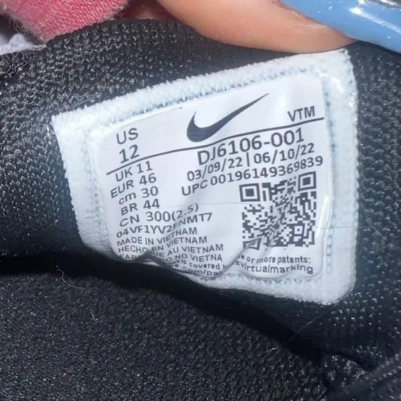 Nike- Black and white running shoe