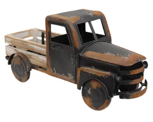 Rustic distressed black metal farm truck decor
