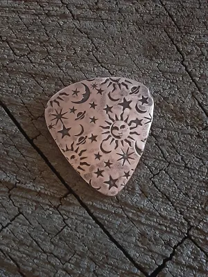 Sun moon and stars copper guitar pick