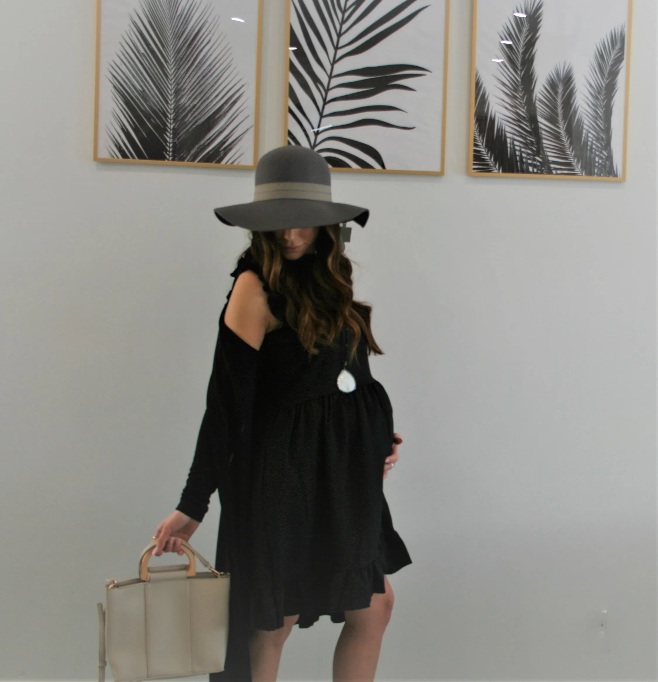 Women's Black Flowy Maternity & Post natal mini dress with ruffle hem and sleeves