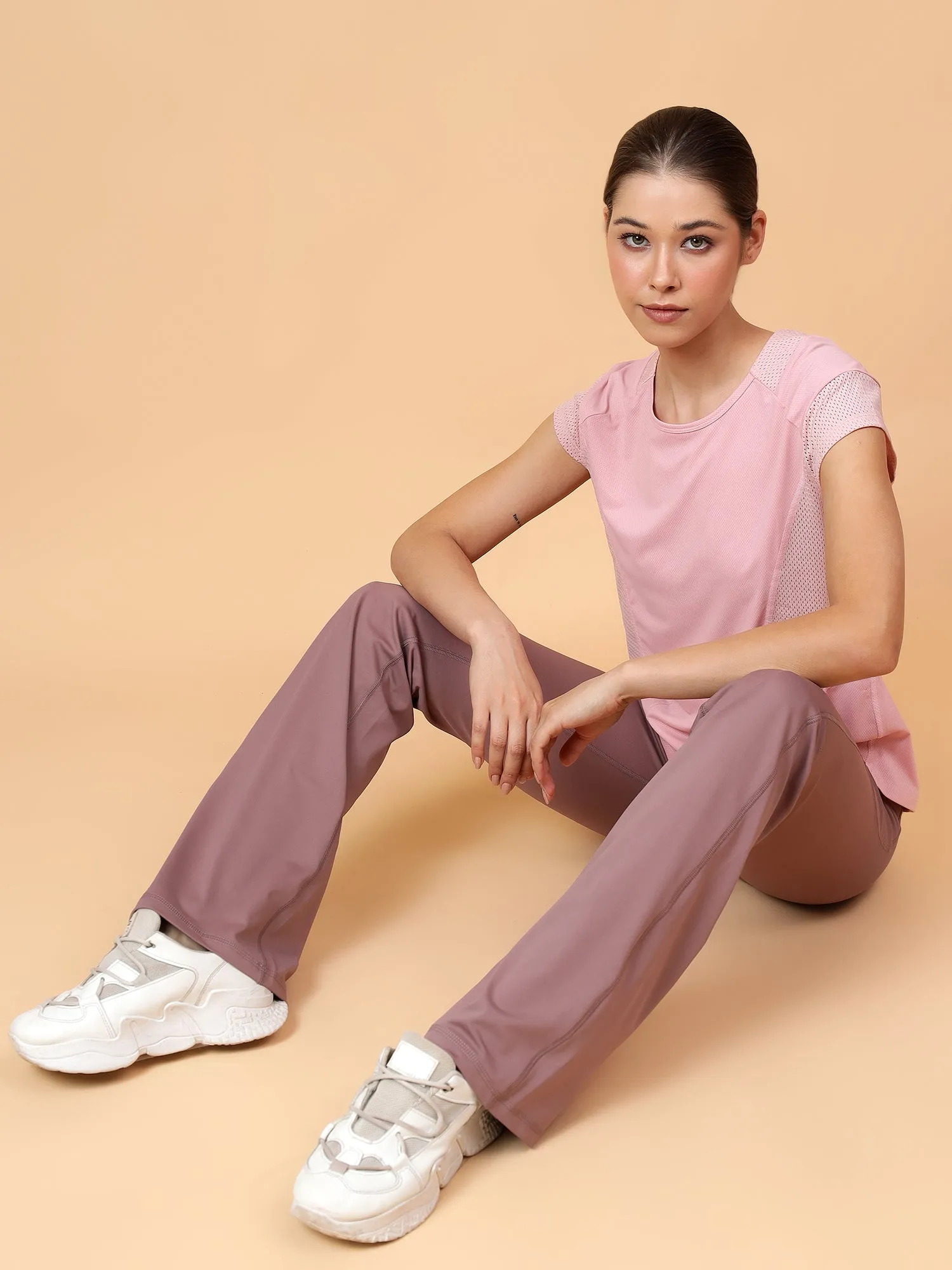 Women's Pink Solid Relaxed Fit Mesh Inserts T-shirt